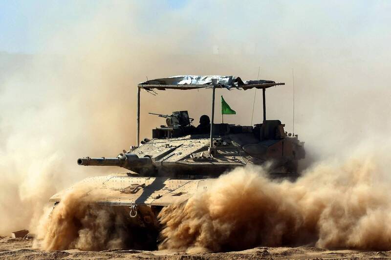 巴勒斯坦消息人士指控，以色列仍企图在加萨走廊保留军队。图为部署加萨的以军部队。（法新社）